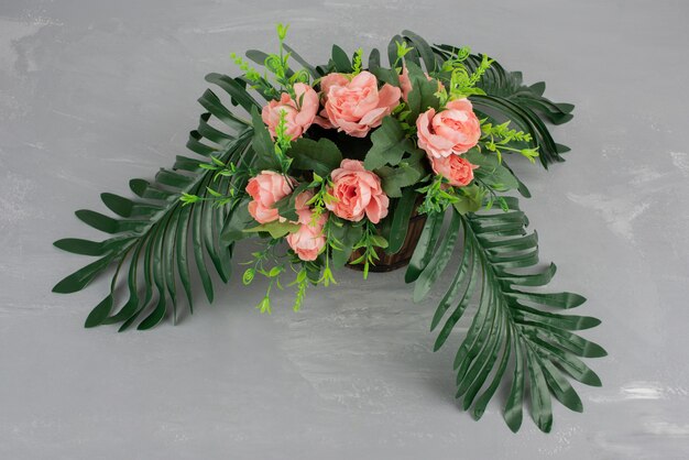 Beautiful bouquet of flowers on grey table