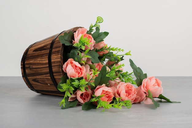 Beautiful bouquet of flowers on grey table.