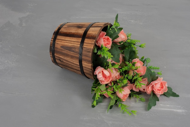 Beautiful bouquet of flowers on grey table.