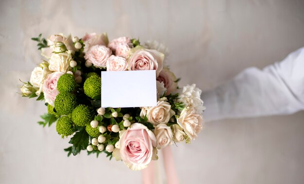 Beautiful bouquet with empty note