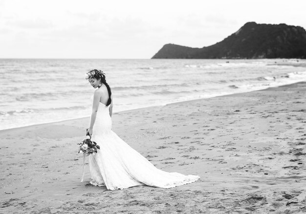 Beautiful bride by the sea