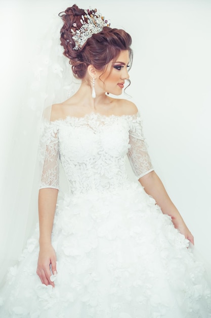 Beautiful bride on a white background