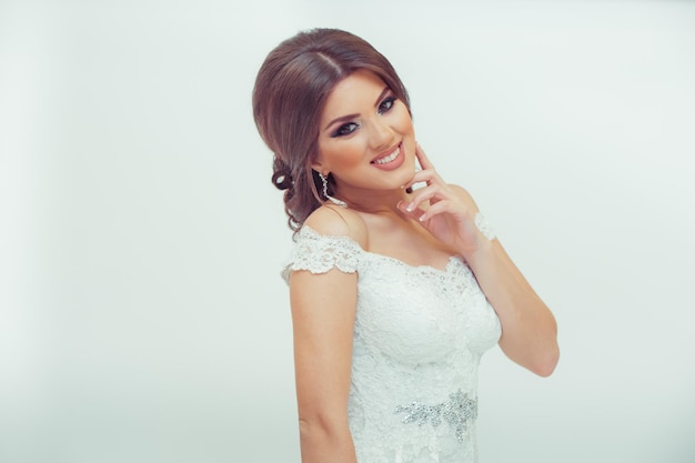 Beautiful bride on a white background