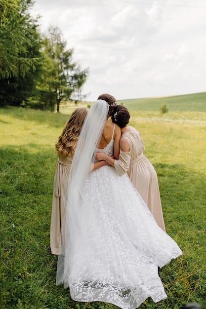 Beautiful bride in white dress posing