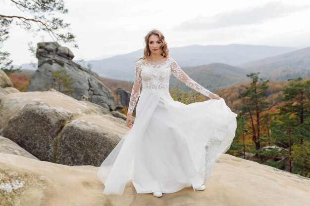 Beautiful bride in white dress posing.