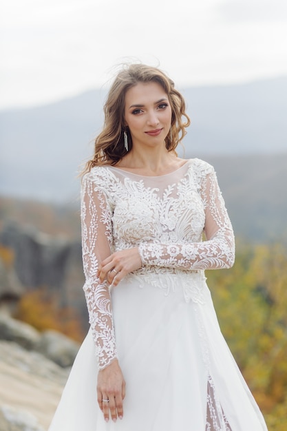 Beautiful bride in white dress posing.