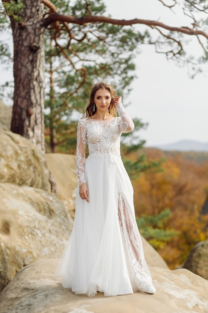 Beautiful bride in white dress posing.