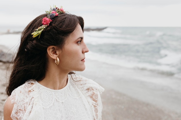 Free photo beautiful bride with flower crown