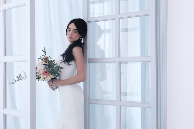 Free photo beautiful bride with white dress