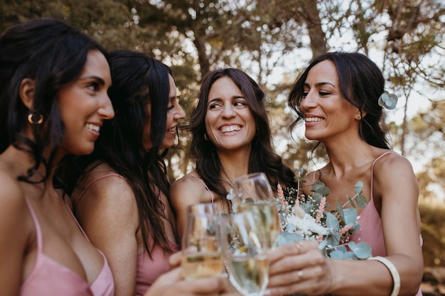 Beautiful bridesmaids having fun outdoors