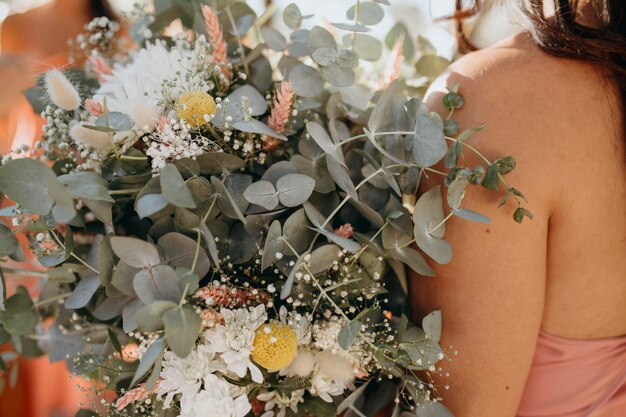 Beautiful bridesmaids in pretty dresses outdoors