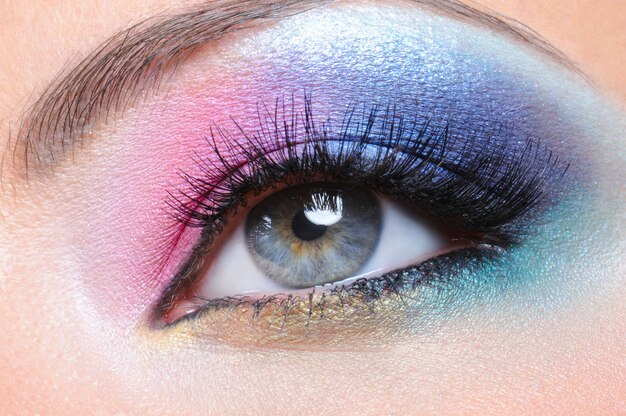 Beautiful bright fashion makeup of female eye - macro shot