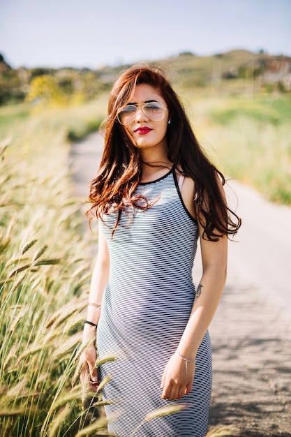 Beautiful brunette on countryside