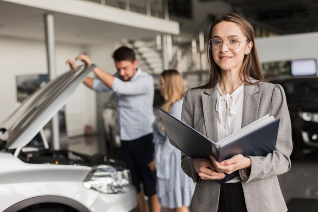 Beautiful business woman looking at photographer