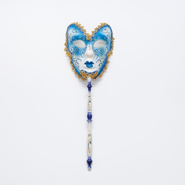 Beautiful carnival mask on stick