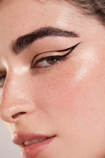 beautiful caucasian woman with black eyeliner