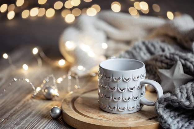 Beautiful christmas cup on a blurred background with bokeh