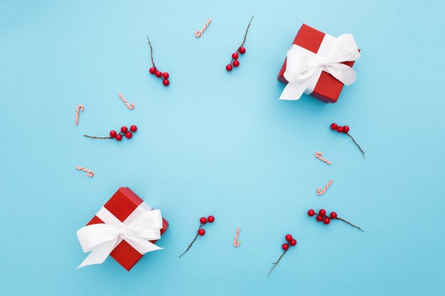 Beautiful Christmas gifts on a light blue background