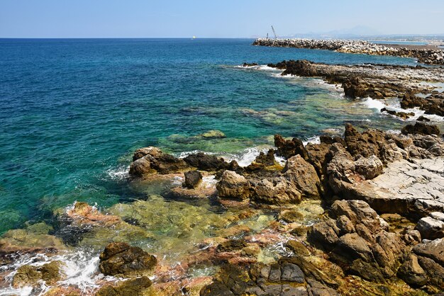 Beautiful clean sea and waves. Summer background for travel and holidays. Greece Crete.. Amazing sce