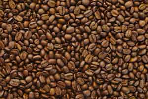 Free photo beautiful closeup shot of brown fresh black coffee beans