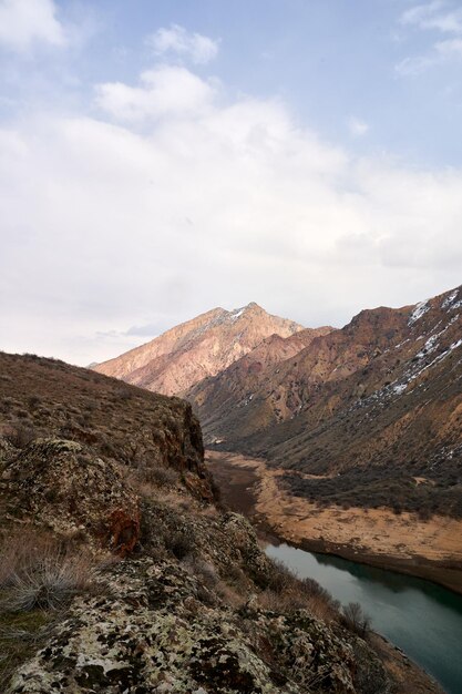 Beautiful closeup shot of a mountain range surrounding the Azat reservoir in Armenia on a cloudy day