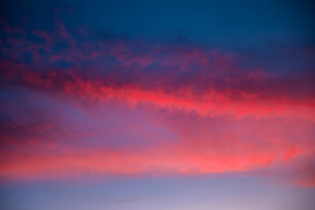 Beautiful clouded sky in pink shades