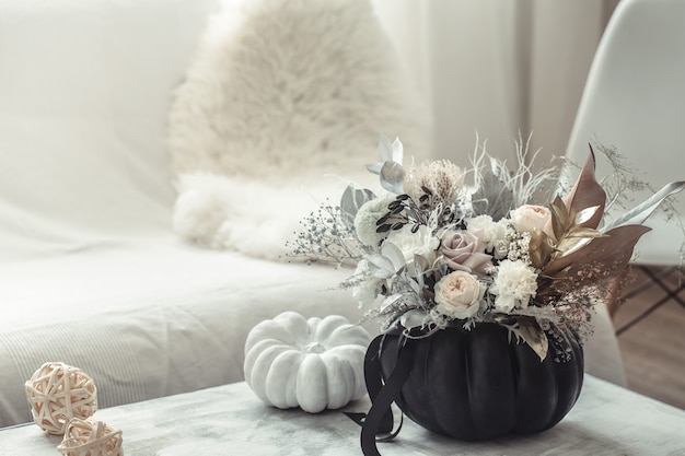 Beautiful composition of flowers in the interior of the room.