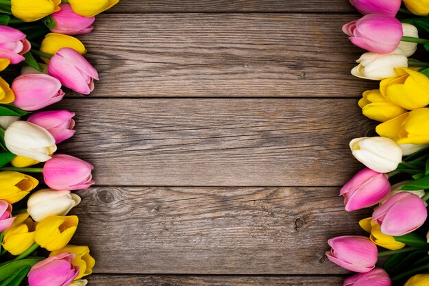 beautiful composition made with tulips on wooden