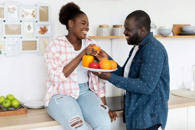 Beautiful couple being together in the kitchen