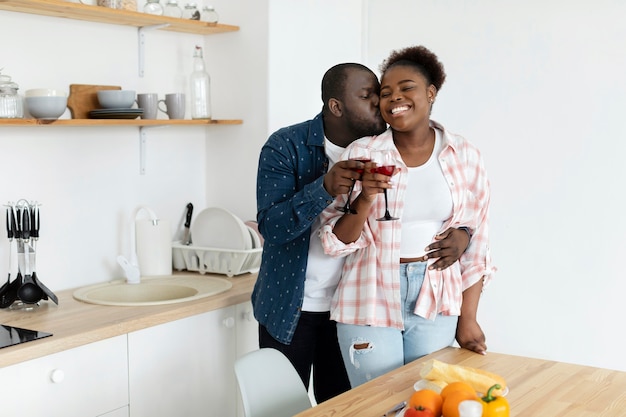 Beautiful couple enjoying a glass of wine together