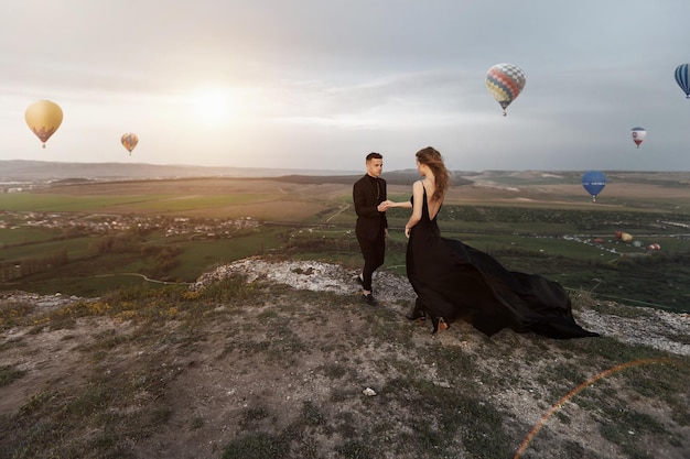 beautiful couple in love in black wear