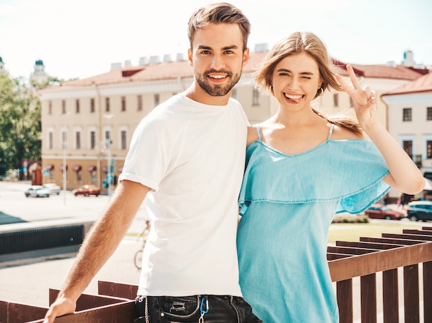 Beautiful couple posing at the street