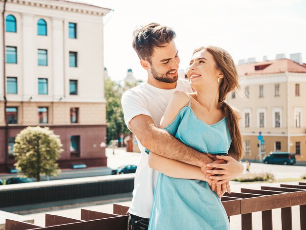 Beautiful couple posing at the street