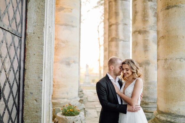 Beautiful couple posing on their wedding day