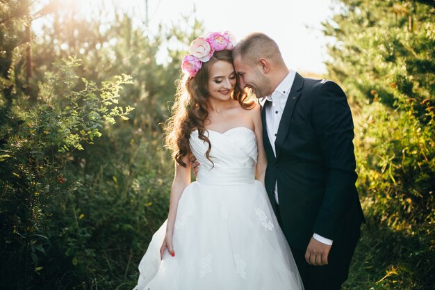 Beautiful couple posing on their wedding day