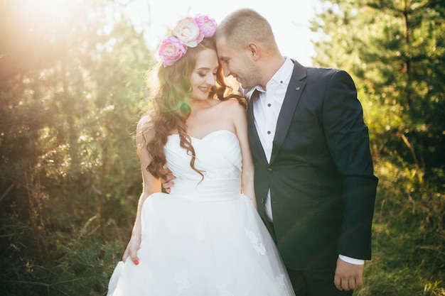 Beautiful couple posing on their wedding day