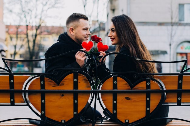 Beautiful couple on romantic bench