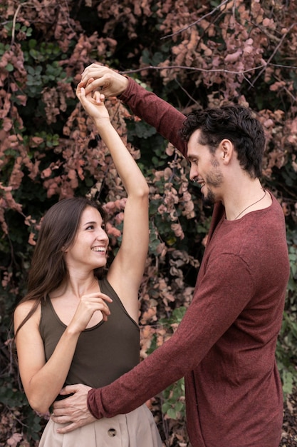 Free photo beautiful couple showing love to each other outdoors