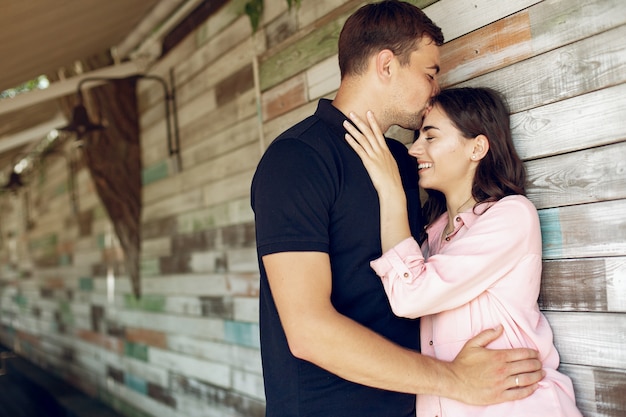 Beautiful couple sitting in a summer cafe