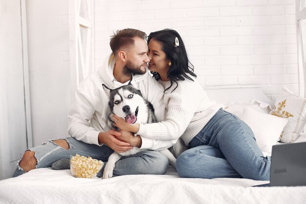 Beautiful couple spend time in a bedroom