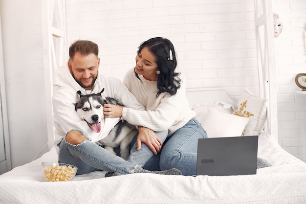 Beautiful couple spend time in a bedroom