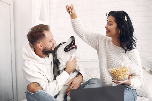 Beautiful couple spend time in a bedroom