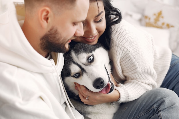 Beautiful couple spend time in a bedroom