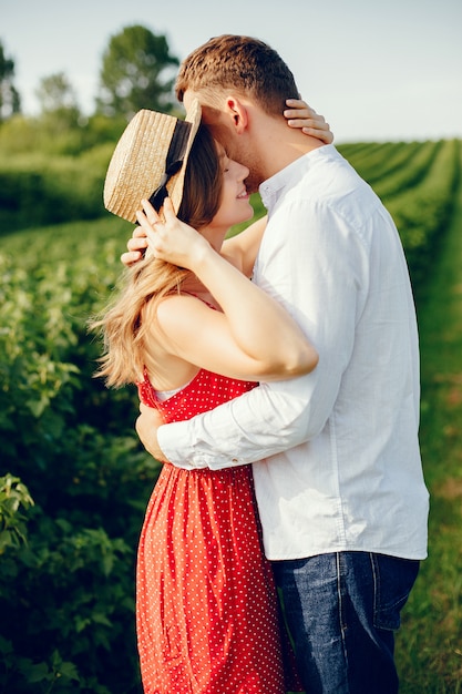 Beautiful couple spend time on a field