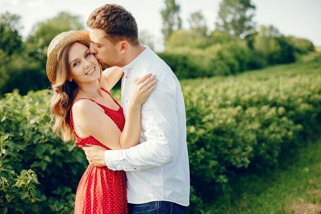 Beautiful couple spend time on a field