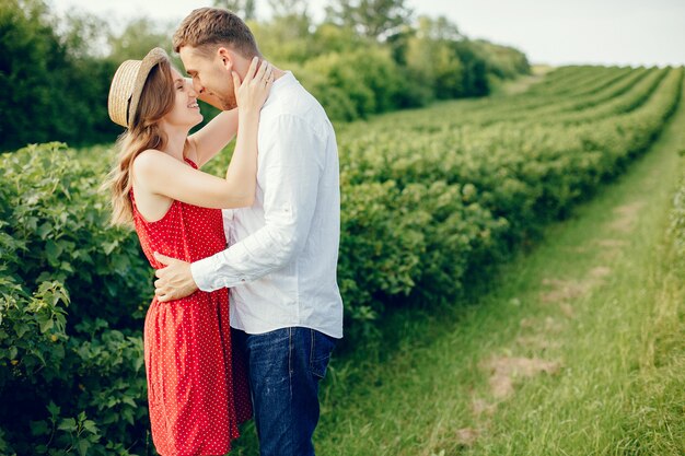 Beautiful couple spend time on a field