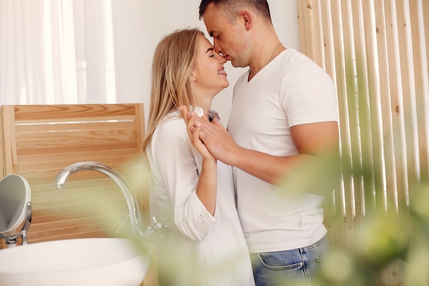 Beautiful couple spend time in a kitchen