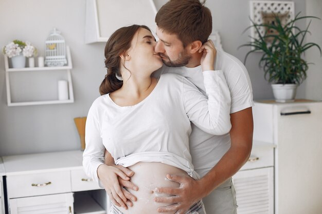 Beautiful couple spend time in a kitchen