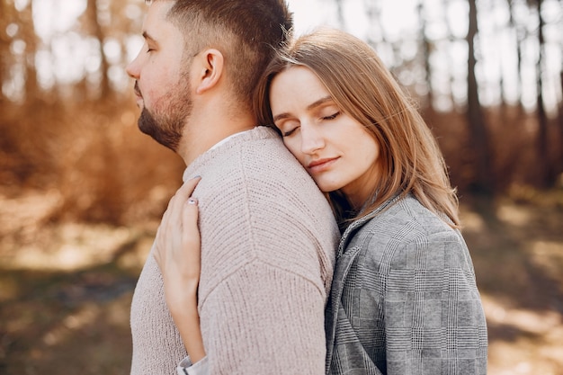 Beautiful couple spend time in a park