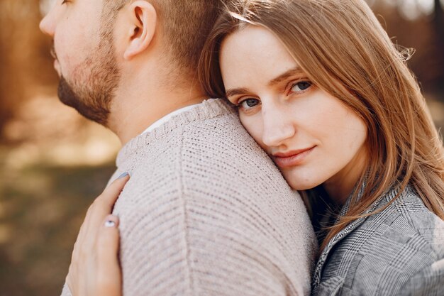 Beautiful couple spend time in a park